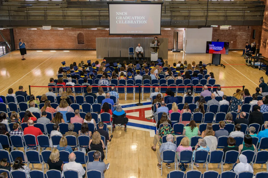 View from above, NSCS graduates in Bear Down Gym